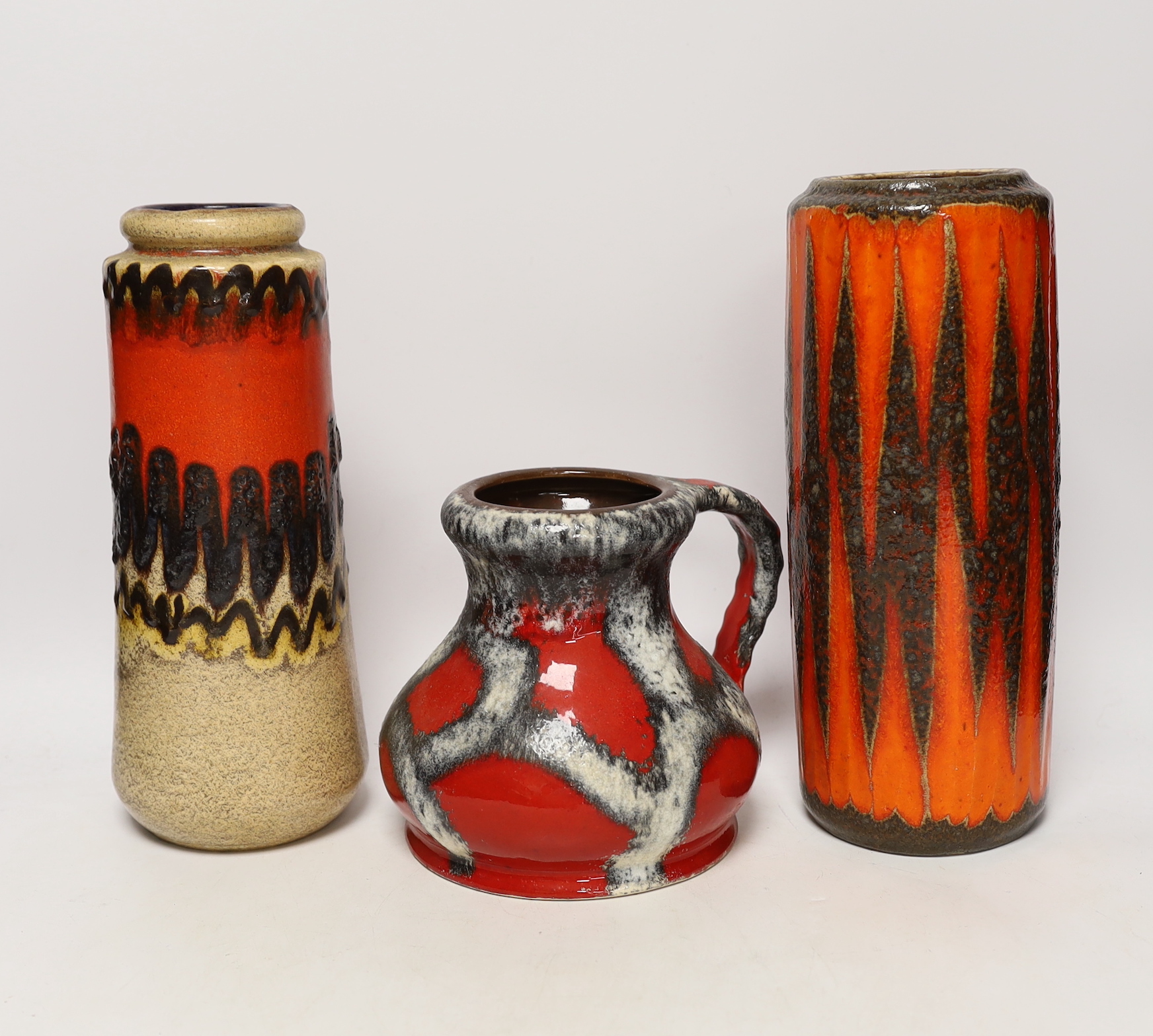 Three West German pottery vases, largest 28cm